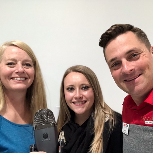 Chad Jordan with Saronna Maldonado and Fileshia Almaguer holding a microphone
